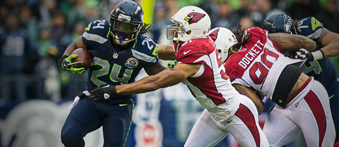 Marshawn Lynch avoids a tackle versus the Arizona Cardinals