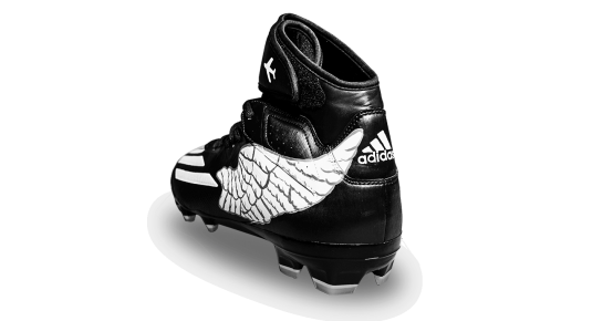 Back of Graham's black cleat, with white wing on left side
