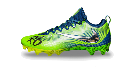 Left view of Sherman's blue and green cleat with reflective Nike swoosh
