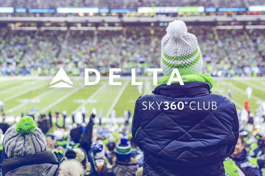 Fans sit inside the Delta Sky360 Club